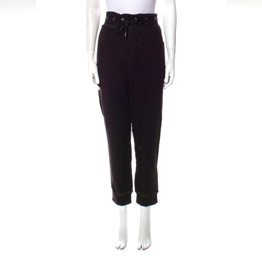 Genuine Versace black sweatpants with gold accents. Womens Size XL